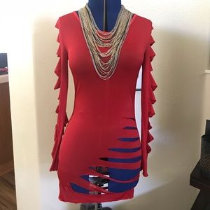 Sexy red party dress w/ peakaboo on hips and arms.